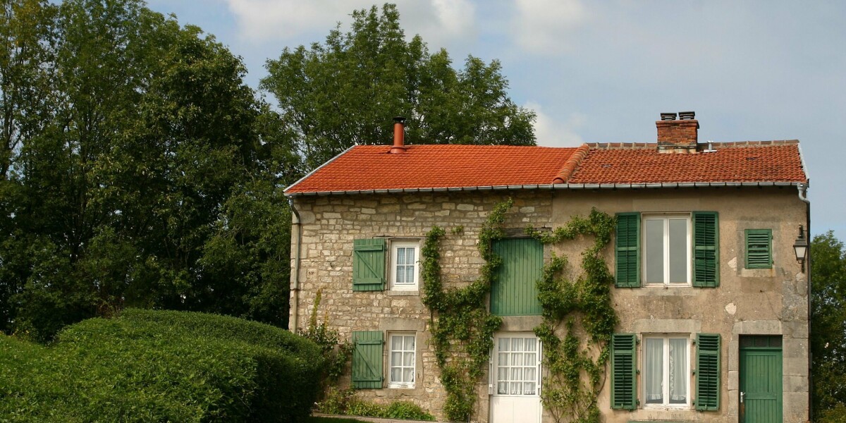 Where is a local tax surcharge applied on second homes in france?
