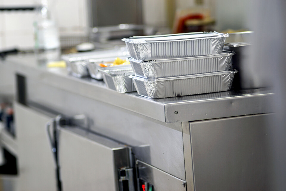 Iskra Antova / Shutterstock A professional restaurant kitchen packages up food in takeaway boxes