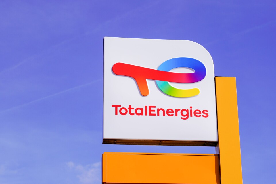 A TotalEnergies petrol sign against blue sky