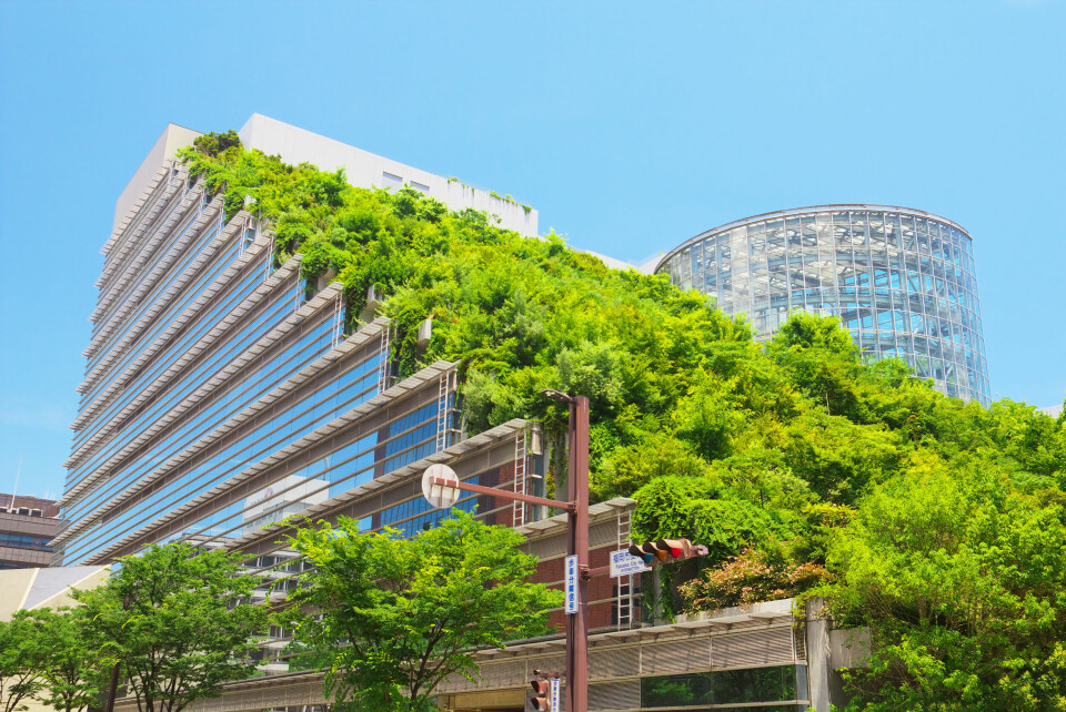 View of the futuristic Acros Fukuoka in Fukuoka, Japan, which has a living green roof