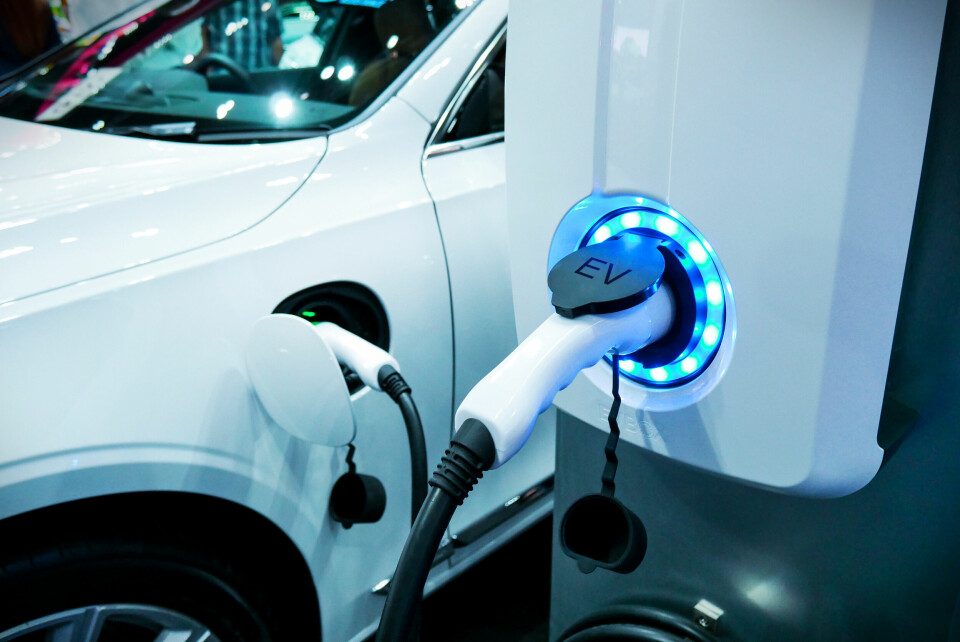 A photo of an electric car being charged