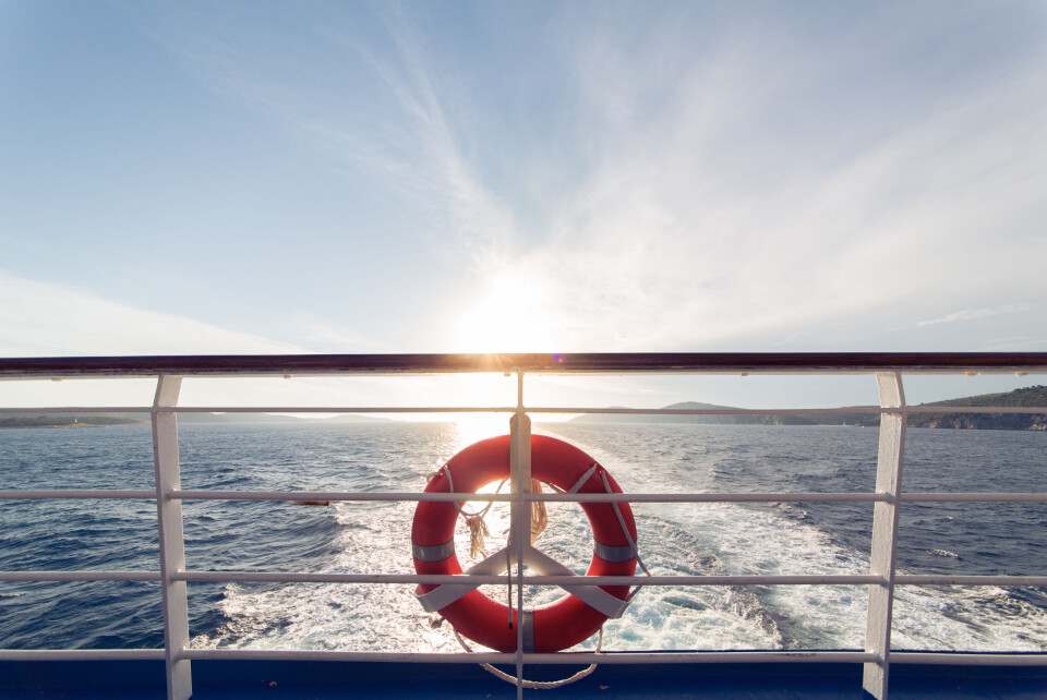 An image of a life belt on the fencing around a ferry deck