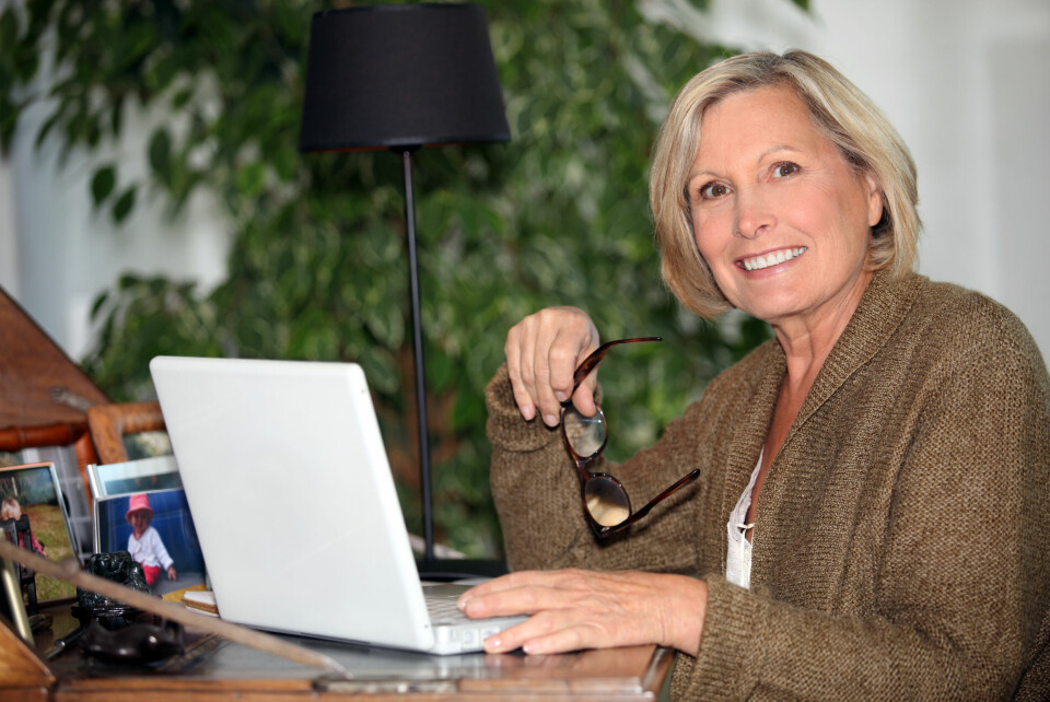 Middle aged woman at laptop