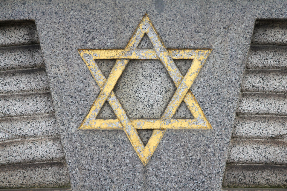 Tupungato / Shutterstock A Star of David in gold on a grey stone