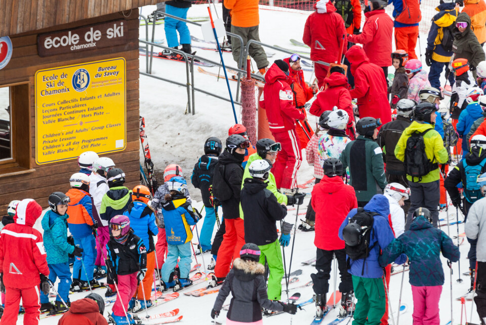 Angelo Cordeschi / Shutterstock A view of a busy ski school area with children and adult skiers in France
