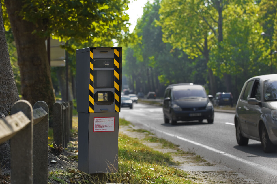 Cars driving past a speed camera