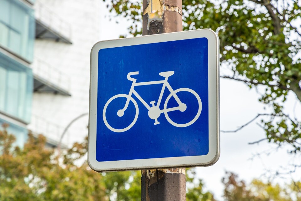 JeanLucIchard / Shutterstock A photo of a bike sign showing a bike lane in France