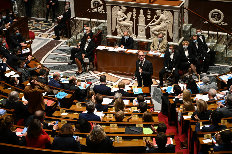 A photo of the Assemblée Nationale hemicycle in session