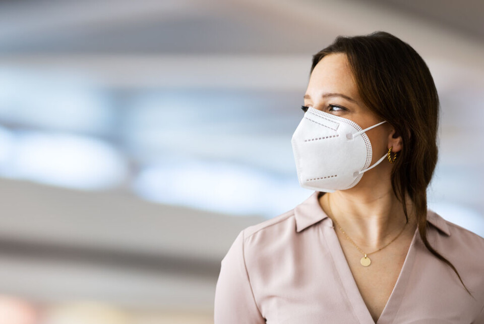 A woman wearing a mask in public