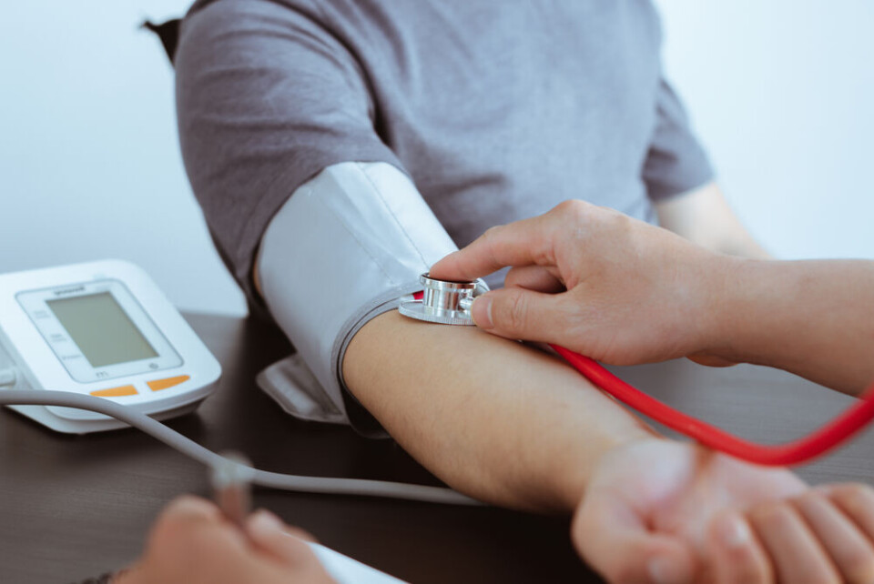 PaeGAG / Shutterstock A photo of a doctor testing a young patient’s blood pressure