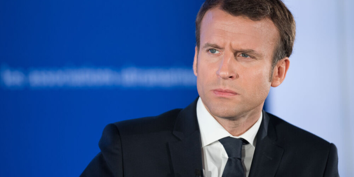 Watch: tomatoes thrown at macron on visit to paris suburb market