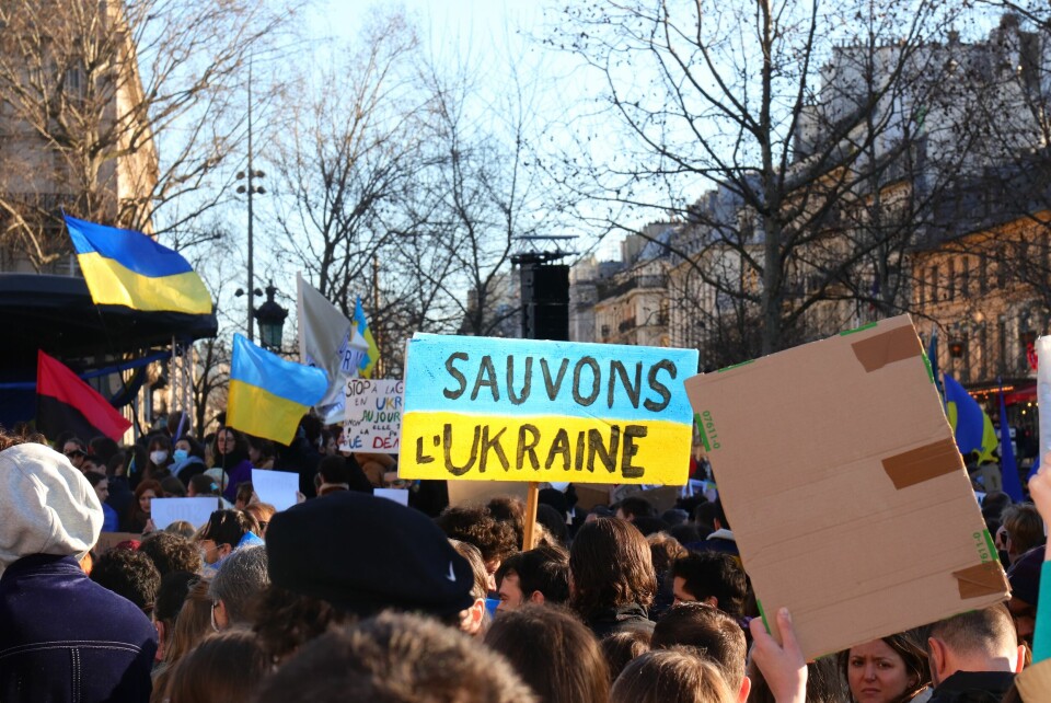Anti-war protesters in France, holding a banner that says “Sauvons L’Ukraine (Let’s save Ukraine)”