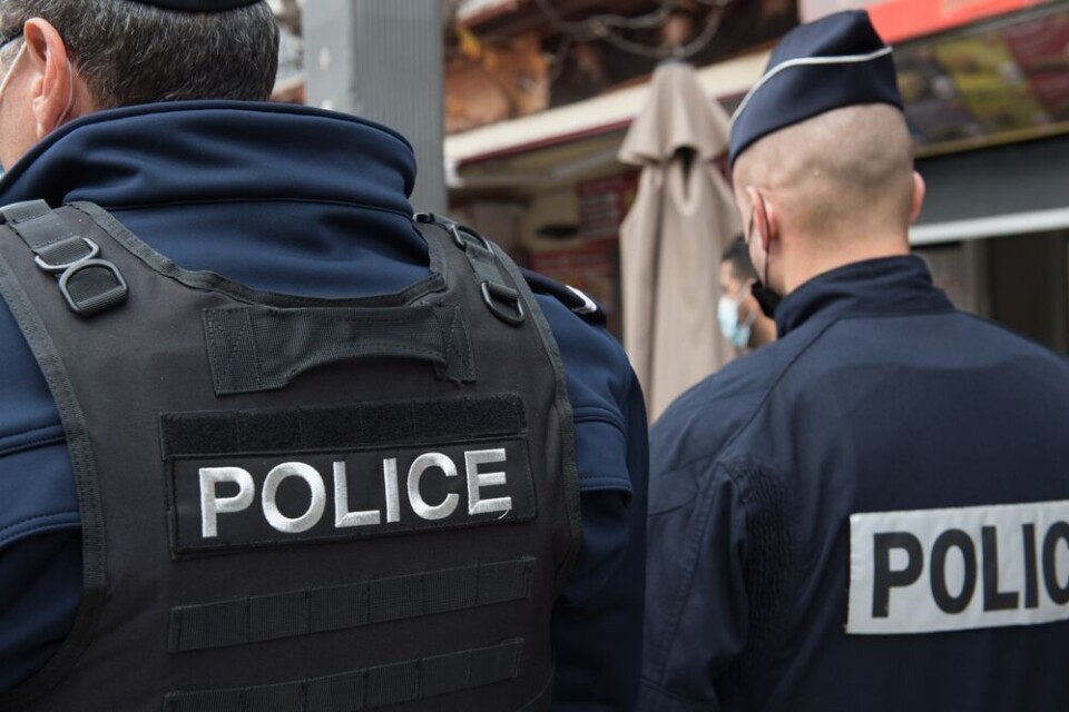 Obatala-photography / Shutterstock Two men wearing police uniforms in France