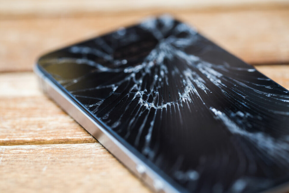 A view of a smartphone with a smashed screen