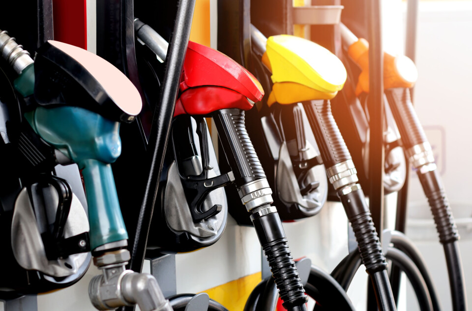 A photo of a row of petrol pumps at a service station