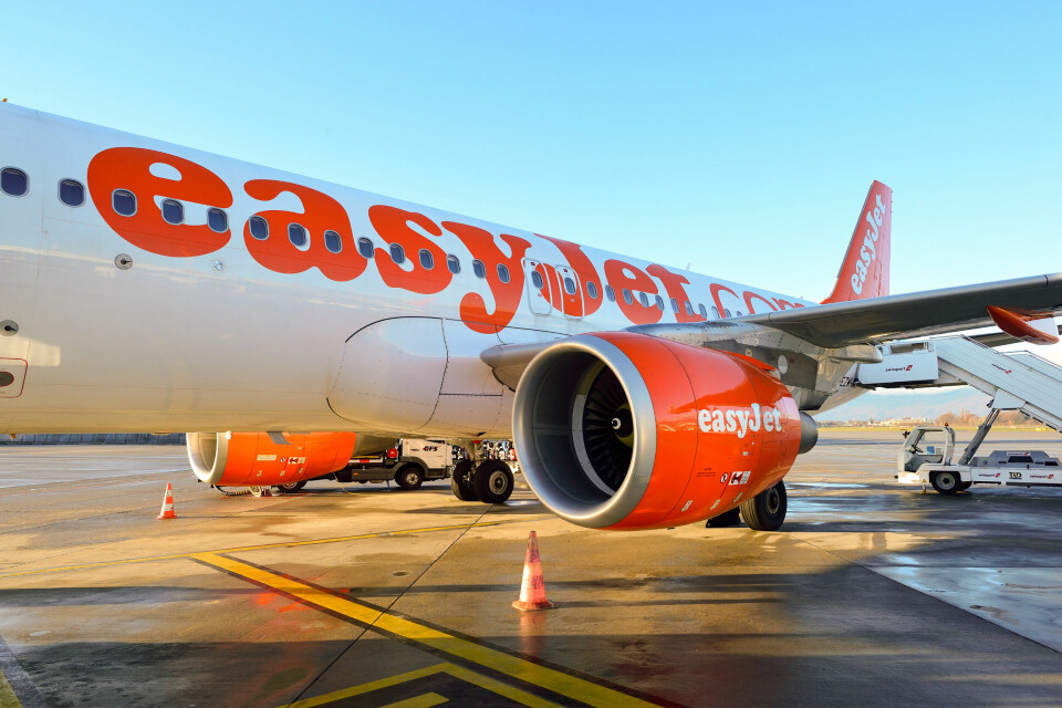 An EasyJet plane on the tarmac at an airport