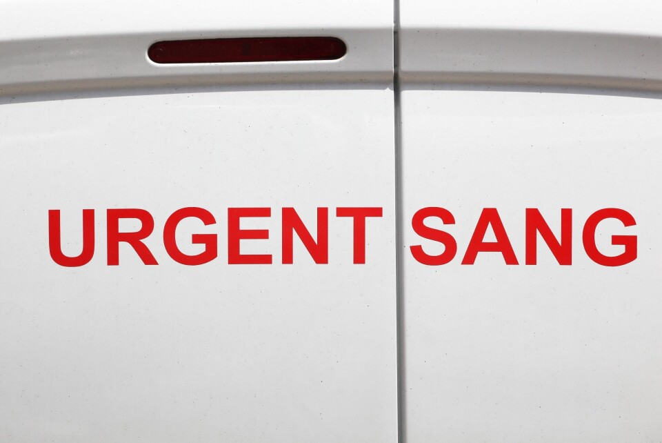 ricochet64 | Shutterstock A photo of a white van with red words in France spelling ‘Urgent: Blood’