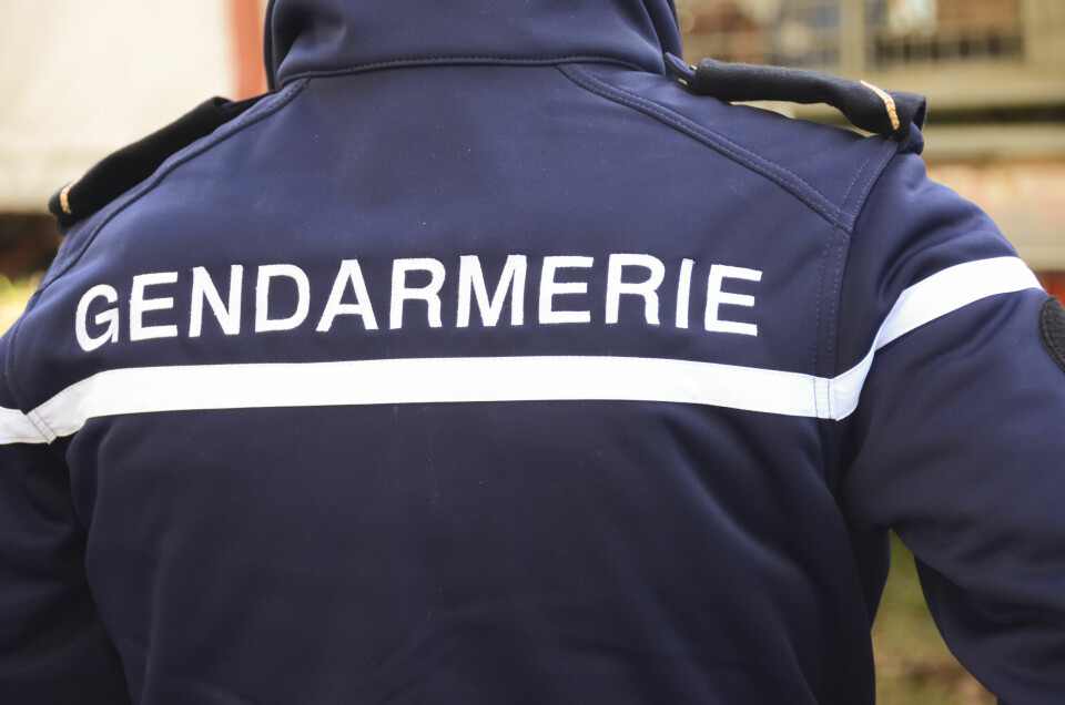 An image of the back of a French gendarme