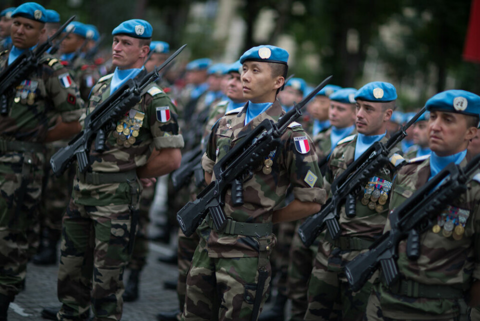 Soldiers from the French Foreign Legion march during the annual Bastille Day military parade