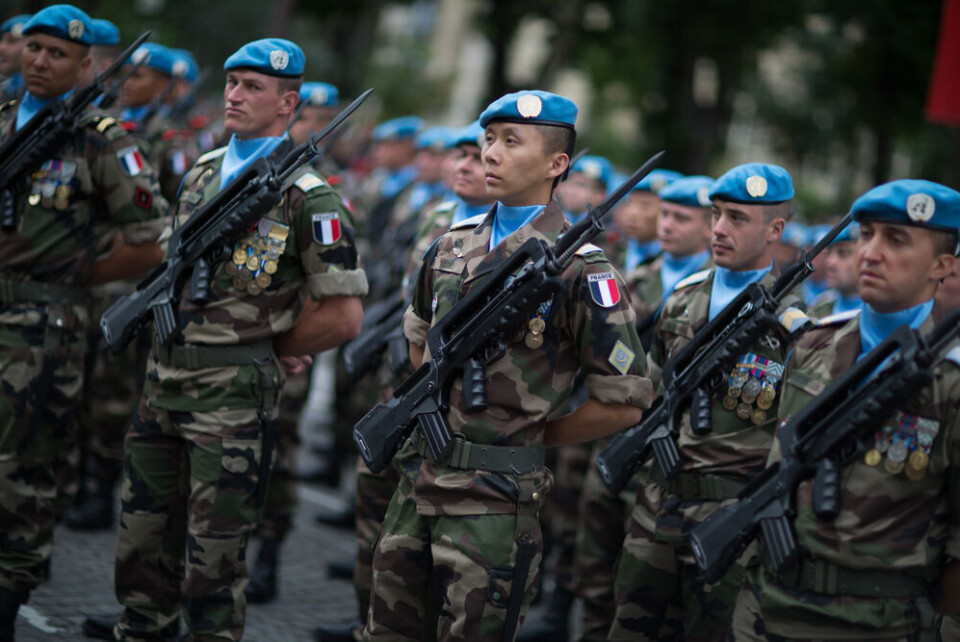 Soldiers from the French Foreign Legion march during the annual Bastille Day military parade