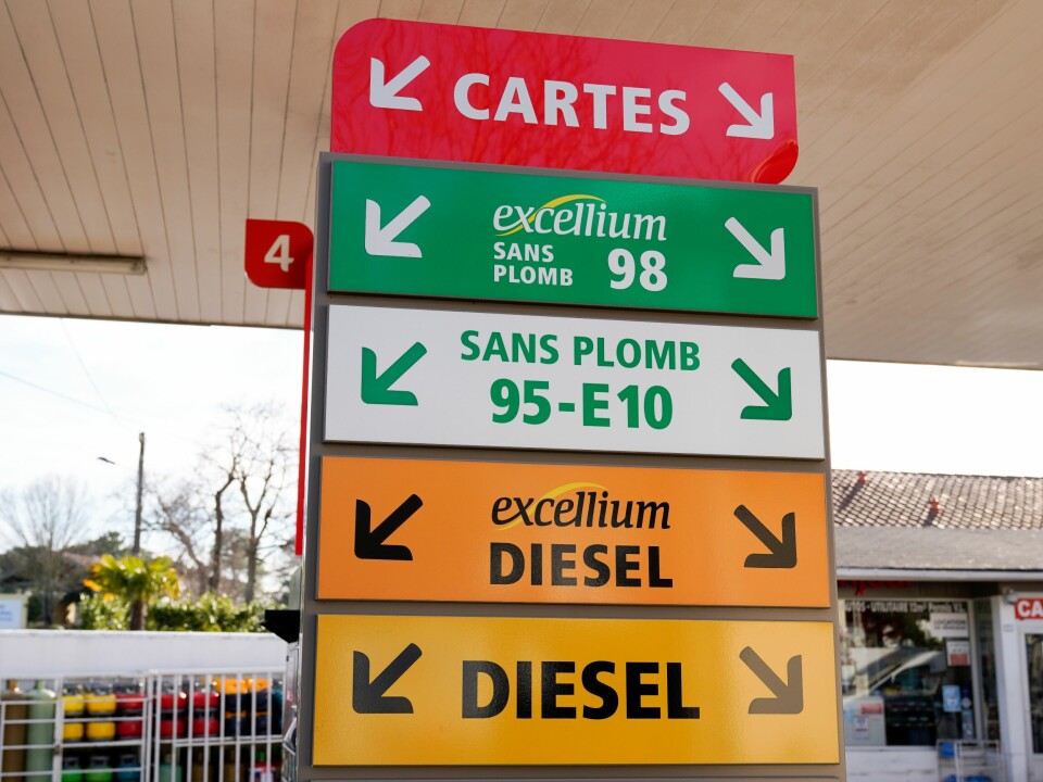 A petrol station in France with signs to each type of fuel