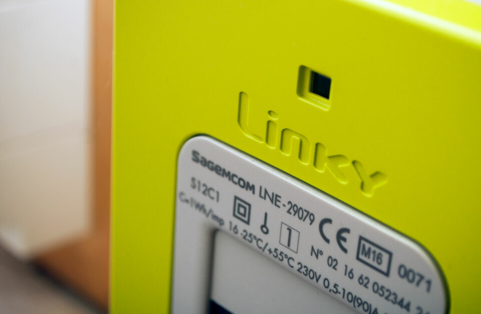 A photo of a close-up of a Linky bright yellow smart meter