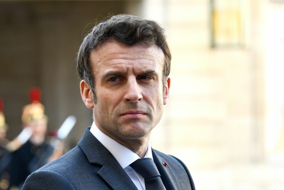 A photo of President Macron looking serious
