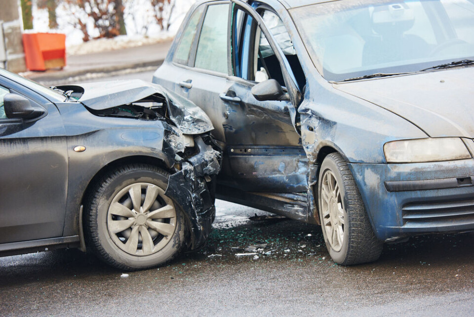 Dmitry Kalinovsky / Shutterstock Two cars smashed up after having crashed together