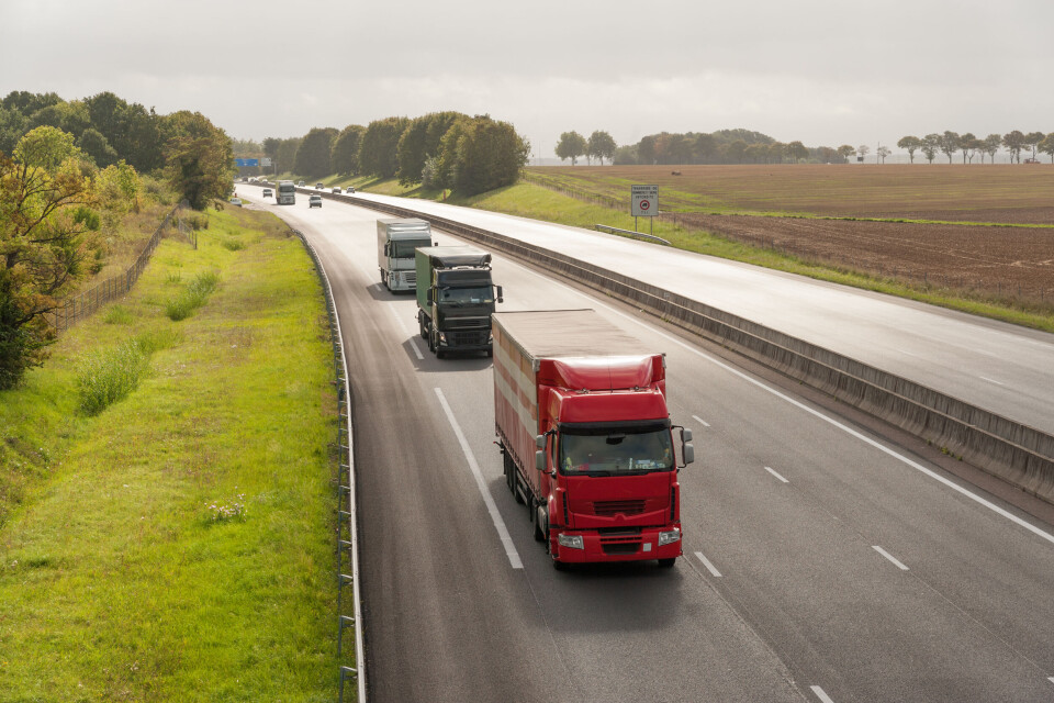 Shutterstock / Natalia Bratslavsky A photo of HGVs on a motorway in northern France