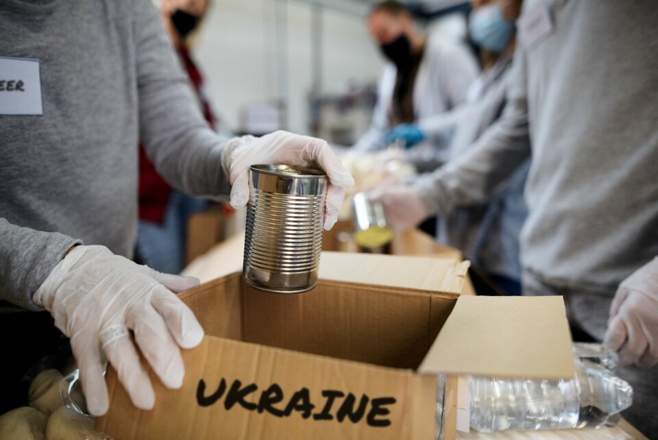 Volunteers packing aid boxes for Ukraine