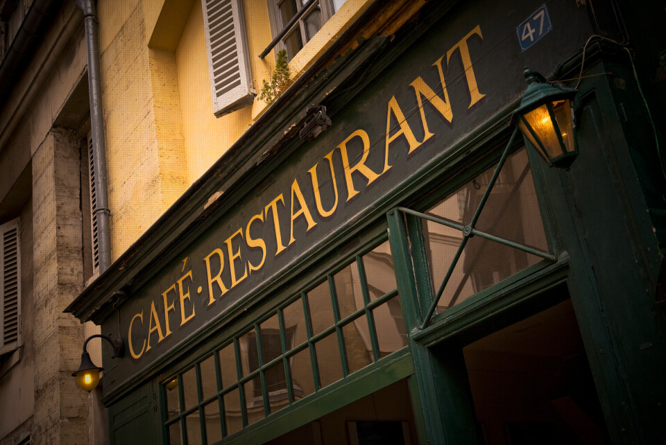 A photo of a café restaurant facade in France