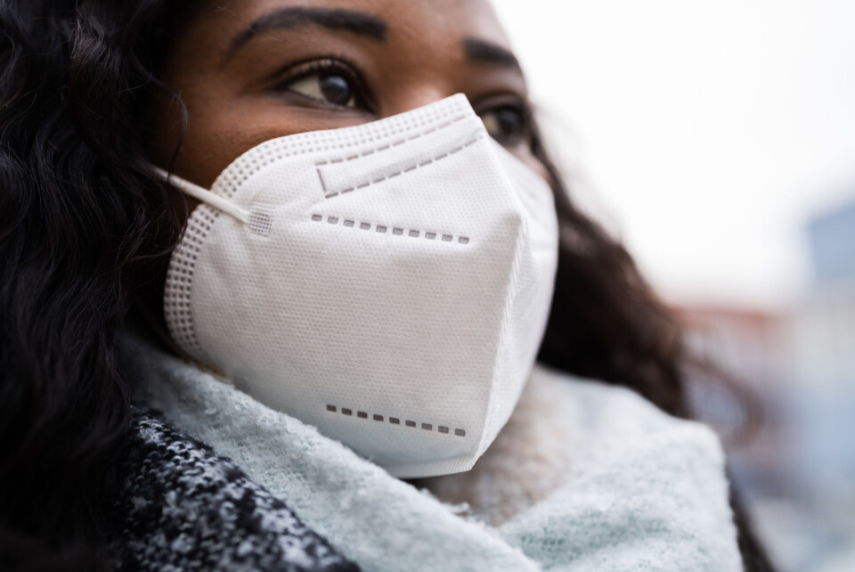Andrey_Popov / Shutterstock A woman wearing a thicker FFP2 face mask outdoors
