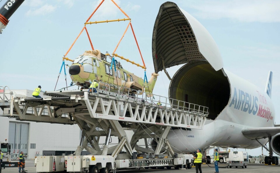 helicopter being loaded into a Beluga Airbus