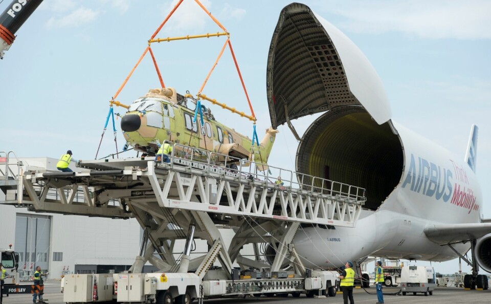 helicopter being loaded into a Beluga Airbus