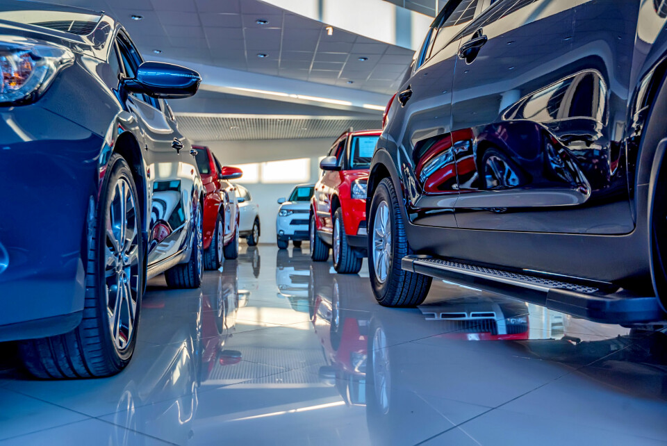 An image of cars in a car dealership