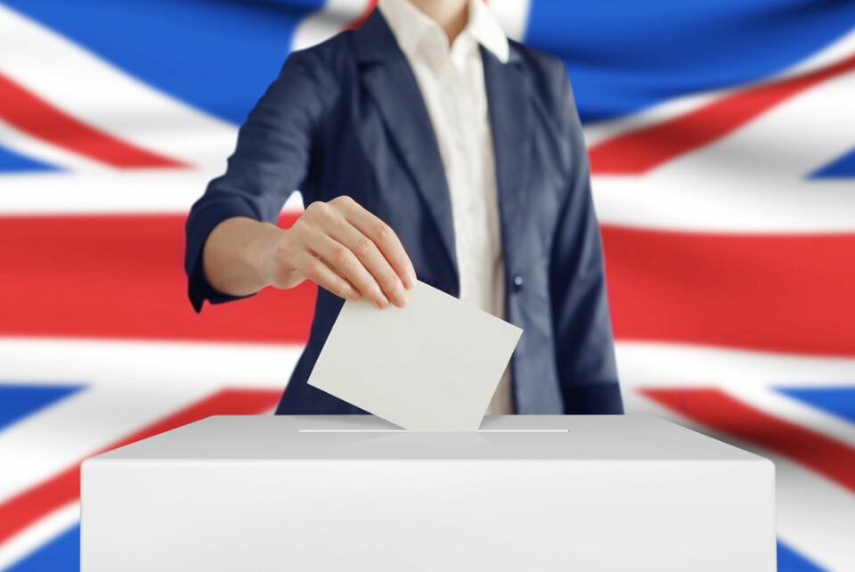 Casting vote in front of British Union Jack