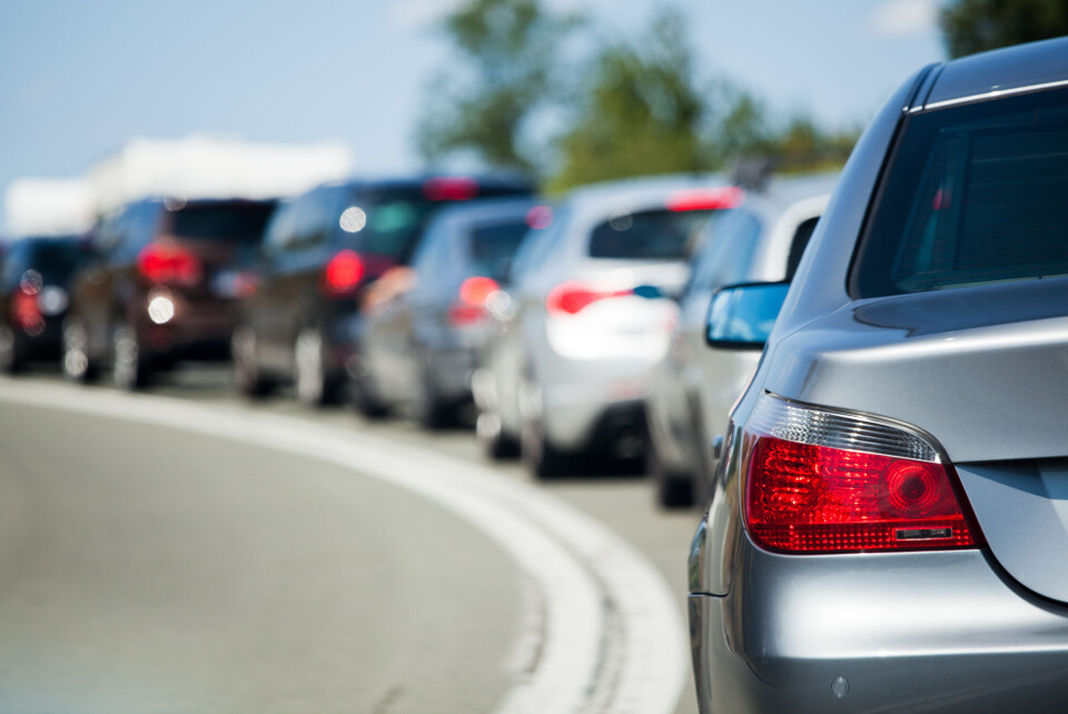 An image of cars waiting in a queue