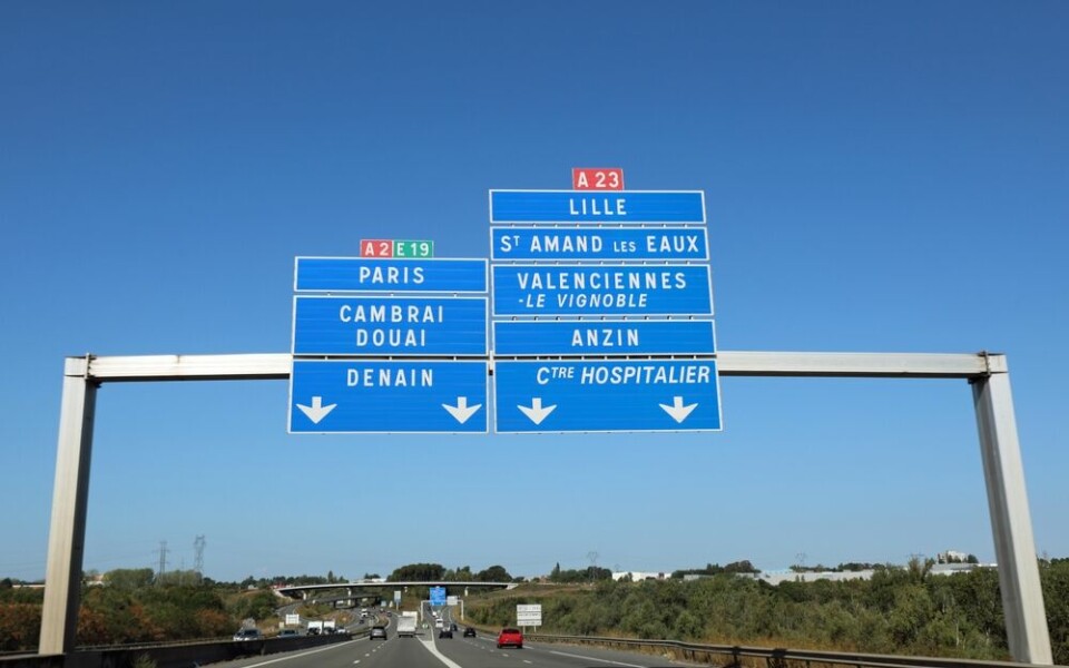 A photo of motorway signs above roads in Lille, including the A2 and A23