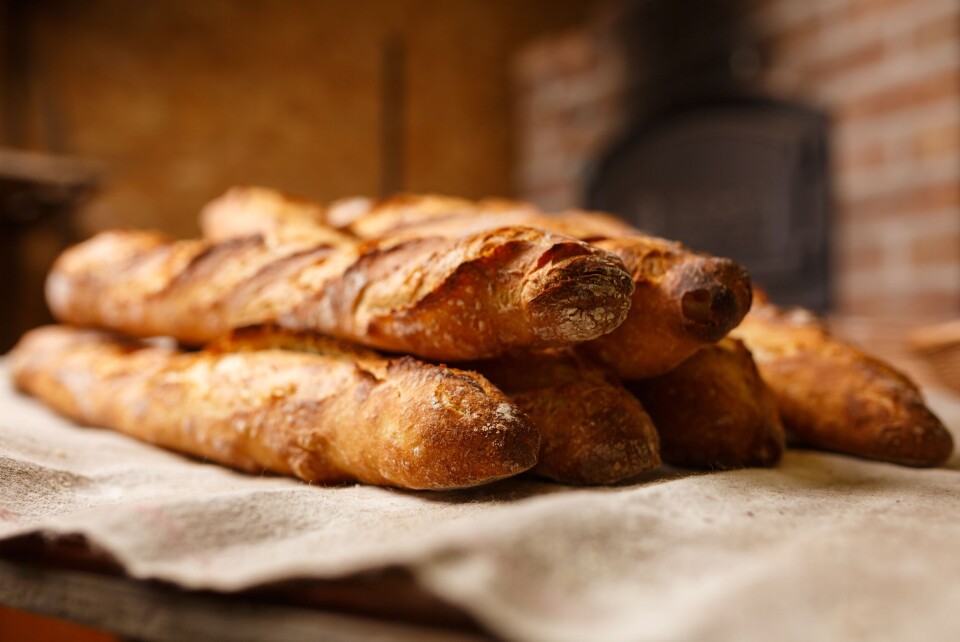 Baguettes lying on the side in a French bakery