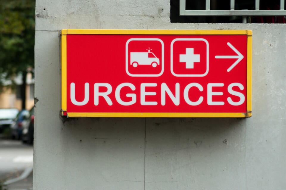Closeup of French hospital emergency entry sign with text in French (Urgences)