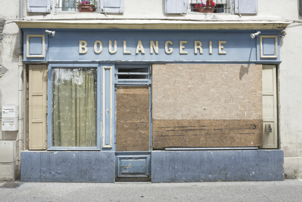 Boarded up French boulangerie