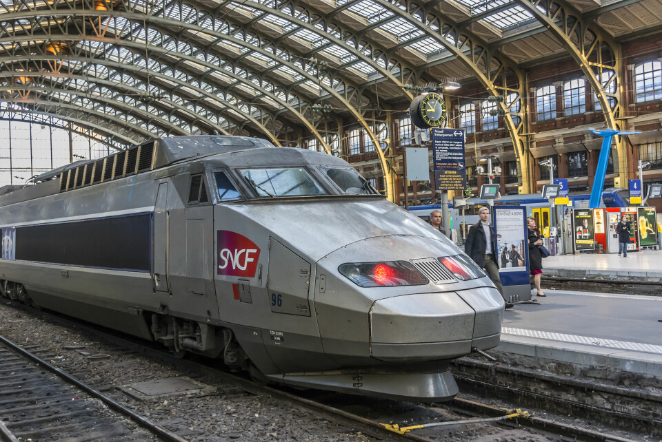 An image of an SNCF train in Lille station