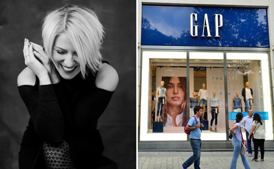 Black and white photo of Lisa Derevycka and GAP window