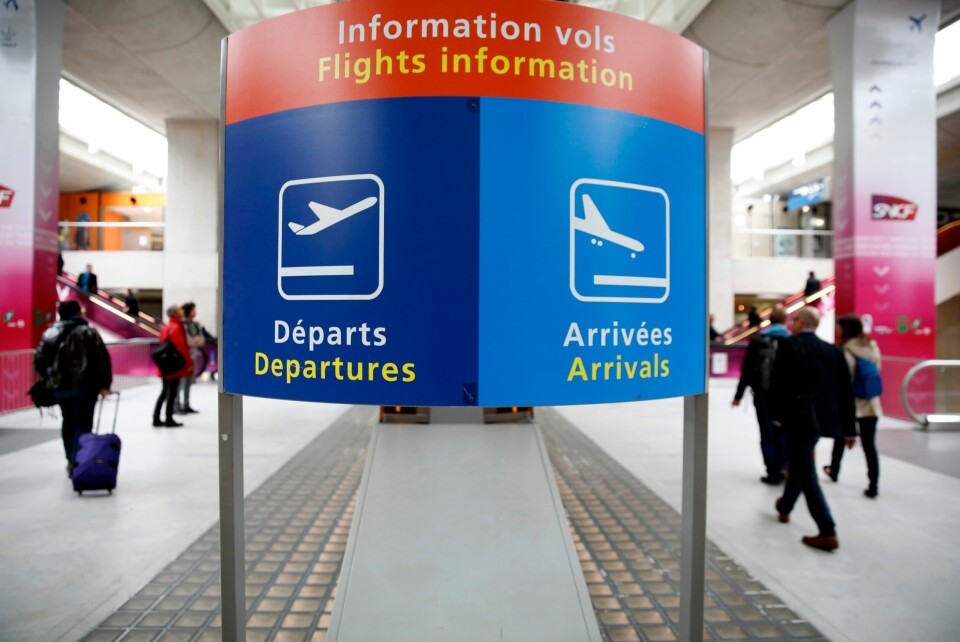 A flight information sign at the Paris Charles de Gaulle airport