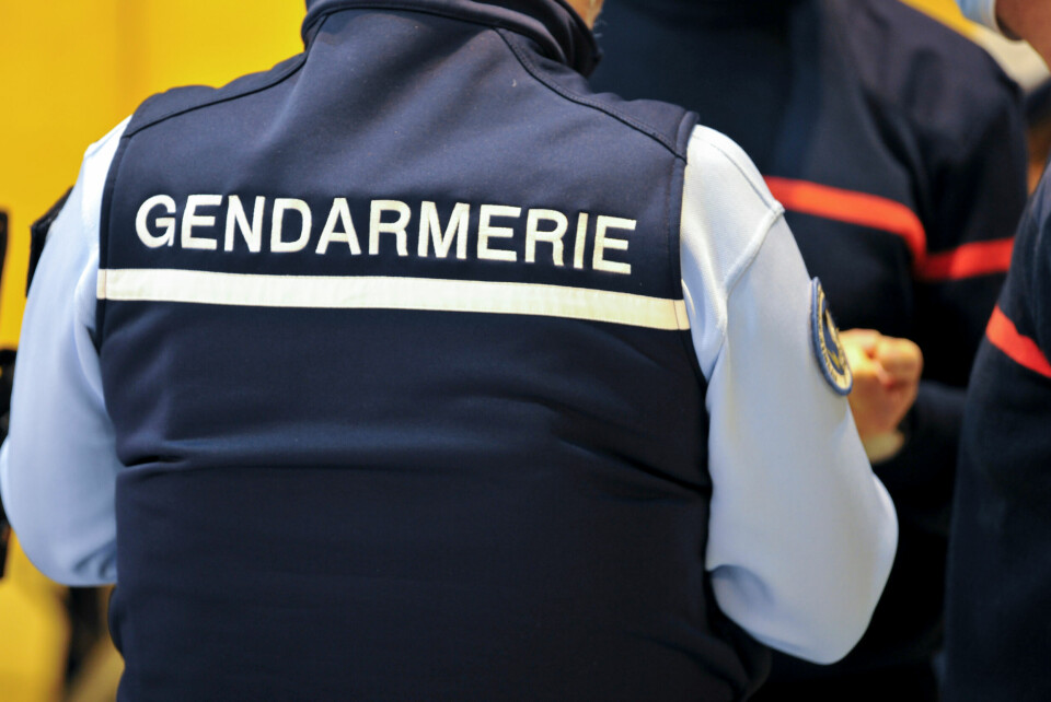 An image of a gendarme taken from behind