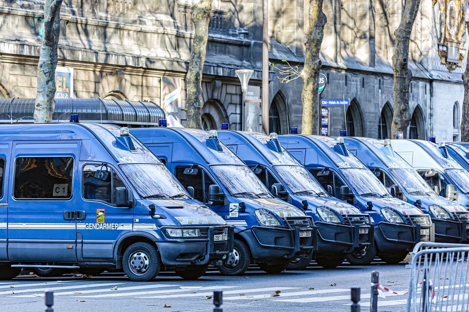 Jacky D / Shutterstock A row of blue gendarmerie vans in Paris