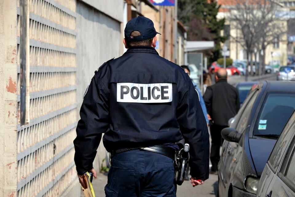 A French policeman walking down the street
