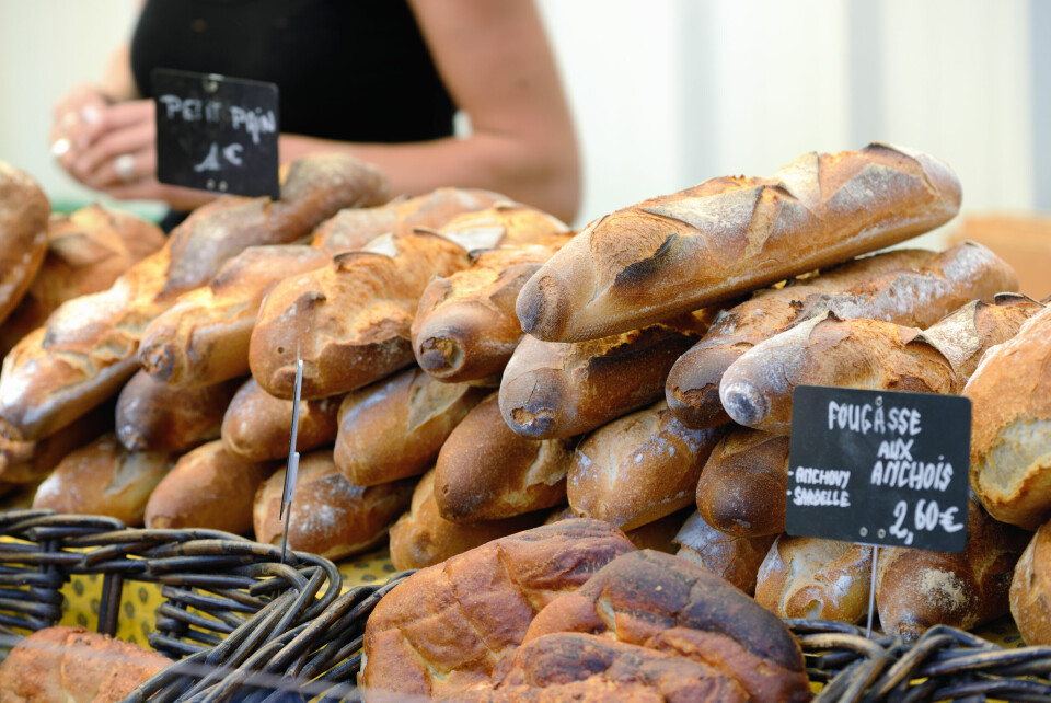 A photo of bread on sale at a market in France