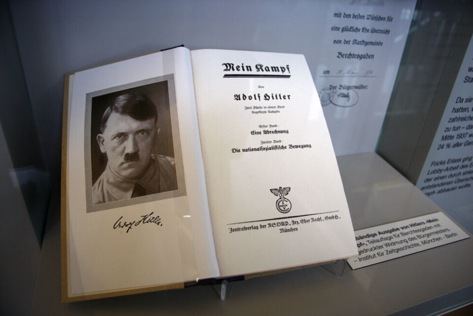 360b | Shutterstock A version of Mein Kampf with a photo of Hitler in the front. New critical version of Mein Kampf to be sold in France from June 2