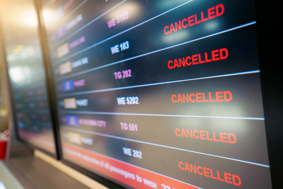 Flights cancellation status on flights information board in airport because of coronavirus. Millions in Europe hit by lack of Covid travel refunds, says EU court